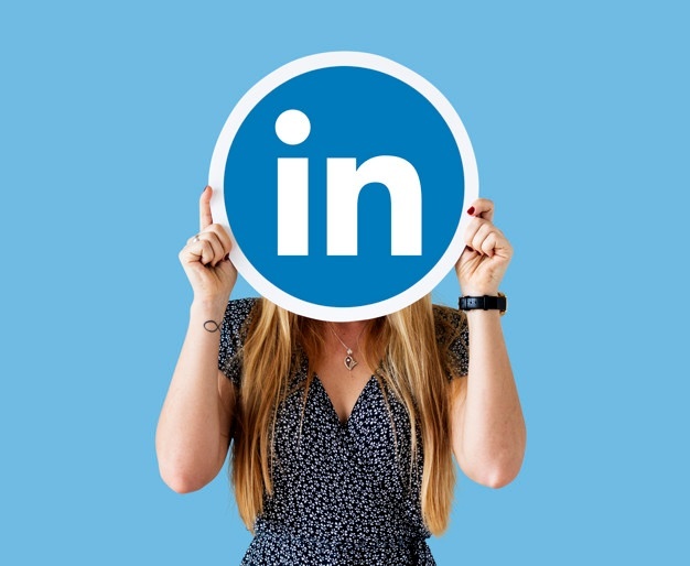 Desktop woman holding linkedin icon 53876 84632