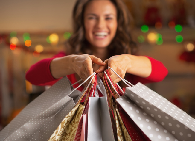 Desktop woman holding shopping bags holiday